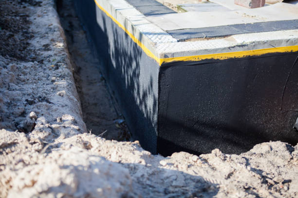 Professional Waterproofing technician working in Plainfield, NJ